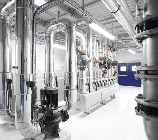 Dechets_Alimentaires_Vision_Recyclage_Paprec Beaucoup de conduits de gaz chromé dans une salle blanche
