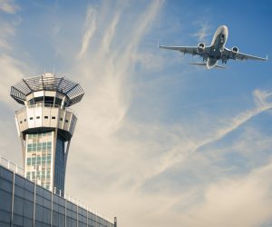 Air Trafic Control tower and airplance at Paris Airport